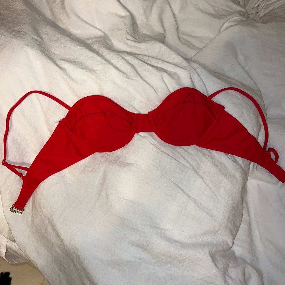 Red bikini top size small. Bought in Peru. Best fits an XS